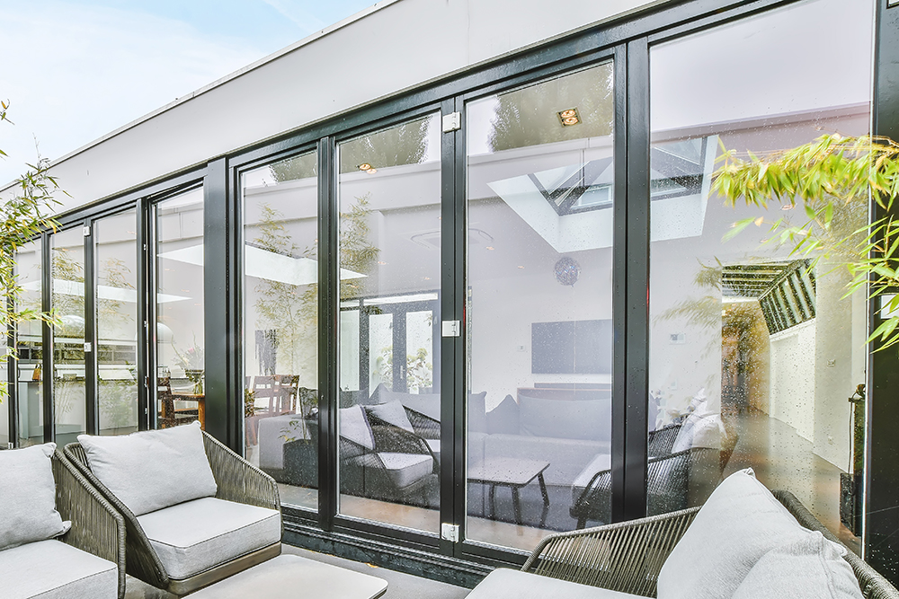 Luxora by R3 provide bifold doors for garden room installations in Hampshire and West Sussex